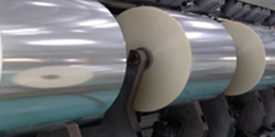 Rolls of paper on machinery