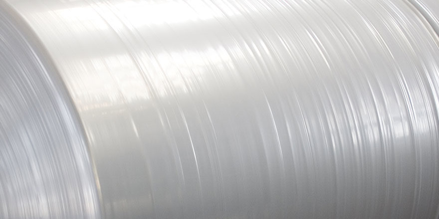 Rolls of plastic laminate